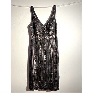 Elegant embroidered and beaded party wear dress that fits the curves perfectly